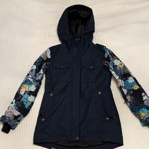 Roxy Women's Jacket with Floral Sleeves - Black and Blue